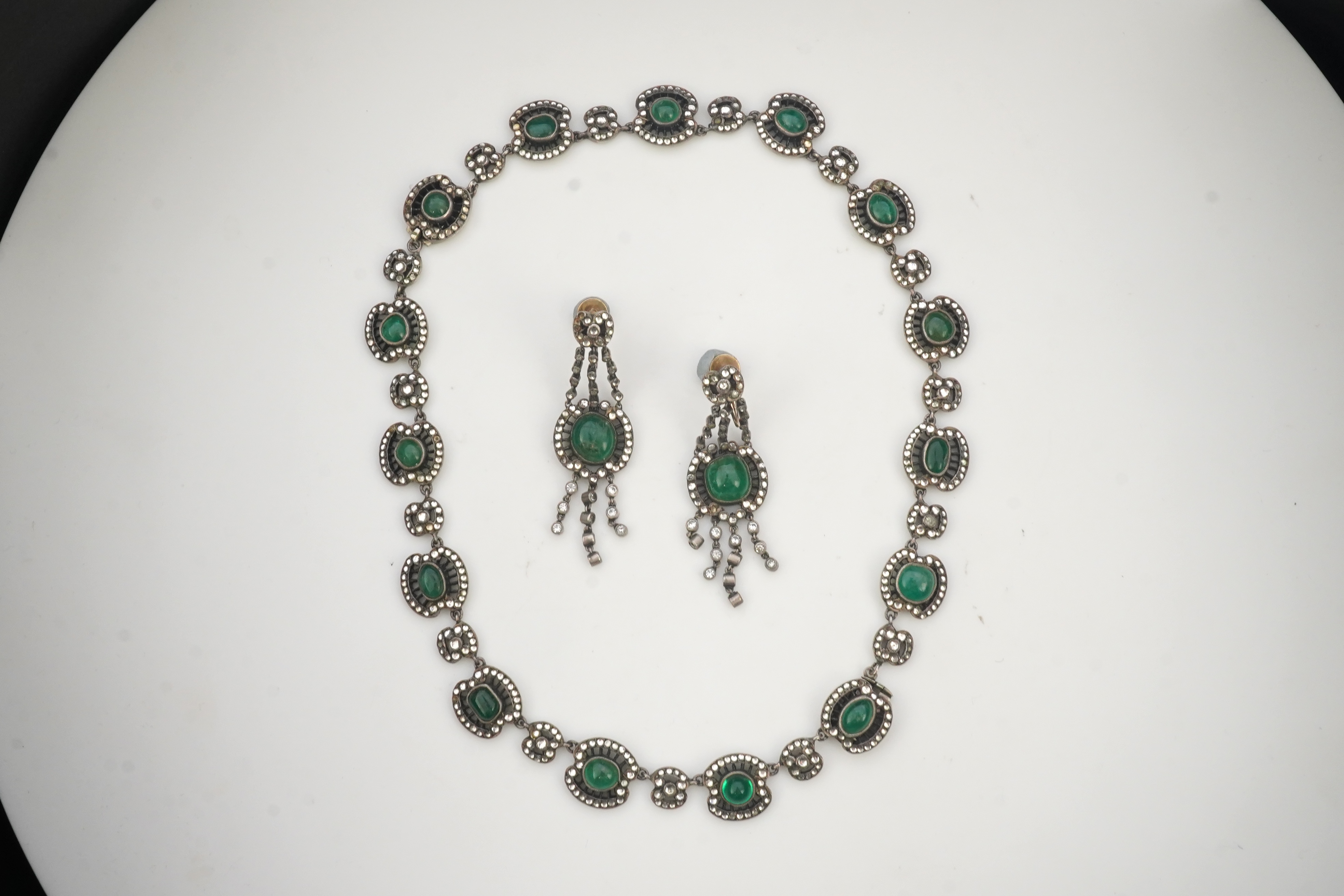 An emerald and rock crystal demi-parure, France, early 20th century